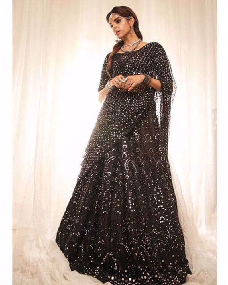 Picture of Sanam makes a statement in our solid black lehnga choli with heavy mirrorwork and our signature dupatta