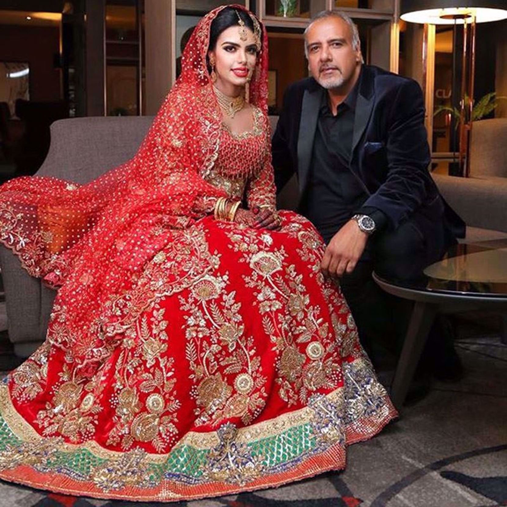 Picture of SUMMAYAH ELAHI IN A TRADITIONAL RED LEHNGA BY NOMI ANSARI