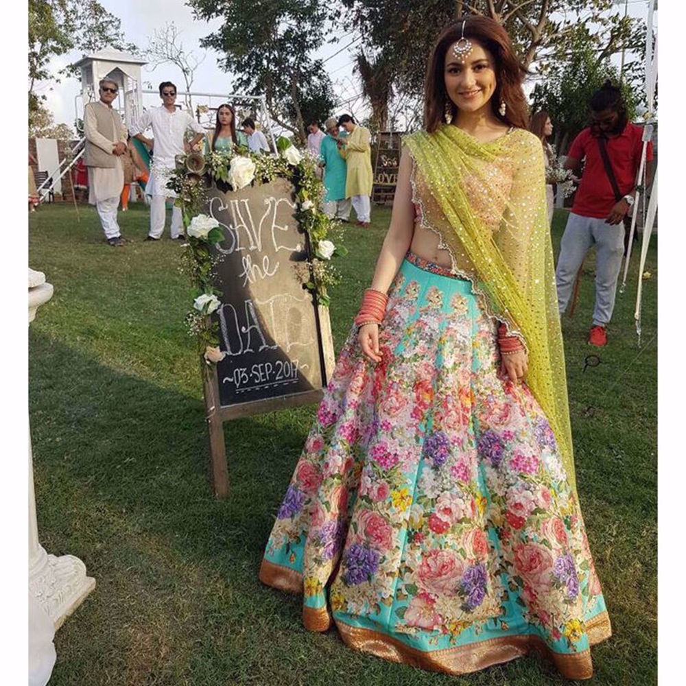 Picture of HANIA AMIR IN A CUSTOM PETAL BLOSSOM BY NOMI ANSARI