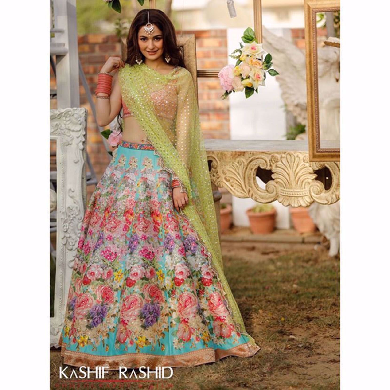 Picture of HANIA AMIR IN A CUSTOM PETAL BLOSSOM DESIGN