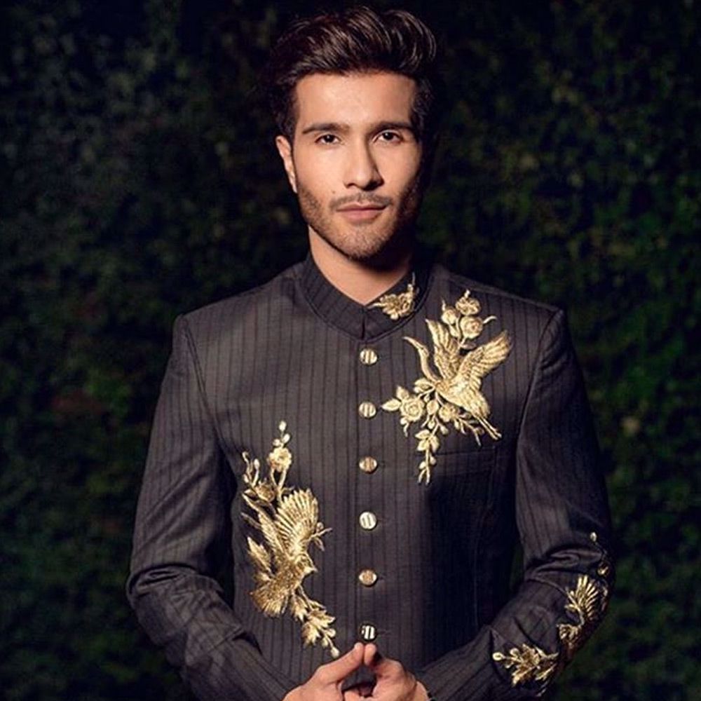 Picture of FerozeKhan is burning it in an embellished @nomiansari Sherwani.