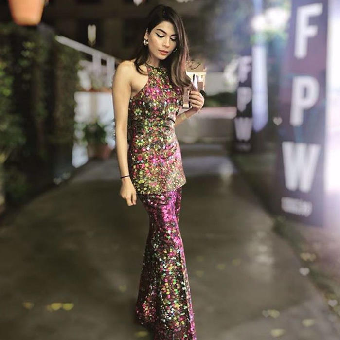 Picture of Amna Babar spotted in a printed silk halter shirt with a wide legged flared pants