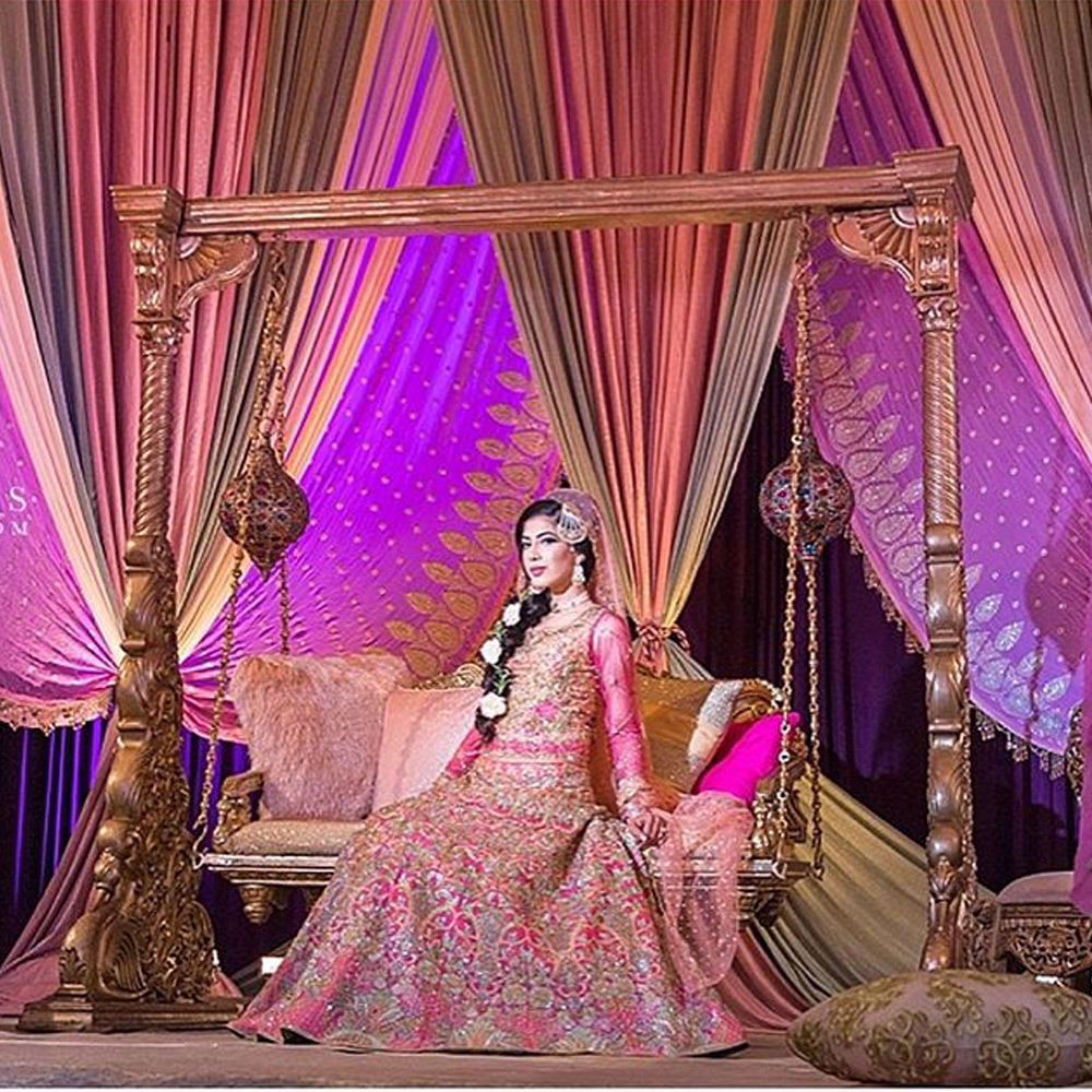 Picture of The stunning #Zoya at her #Mehndi in a #CandyPink #NomiAnsari lehenga Choli