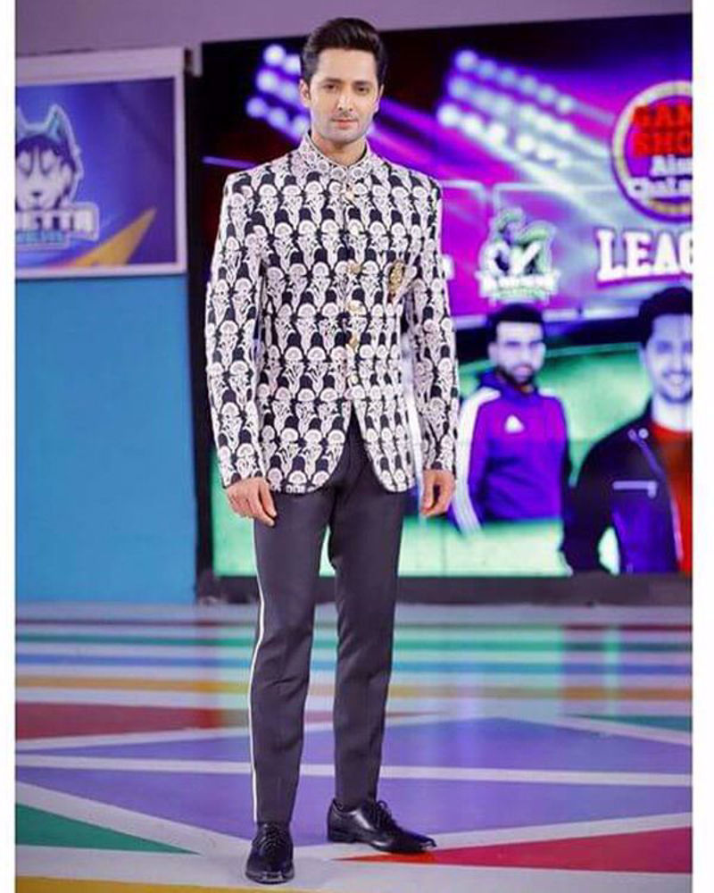 Picture of Danish Taimoor in a Nomi Ansari prince coat with an embellished motif, paired with smartly tailored pants for a festive look