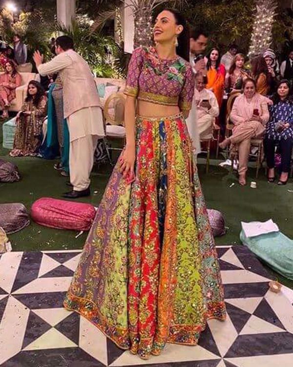 Picture of Mareeha Safdar wears a super colourful, multi-paneled lehnga with rich mirror work, paired with a cute printed choli