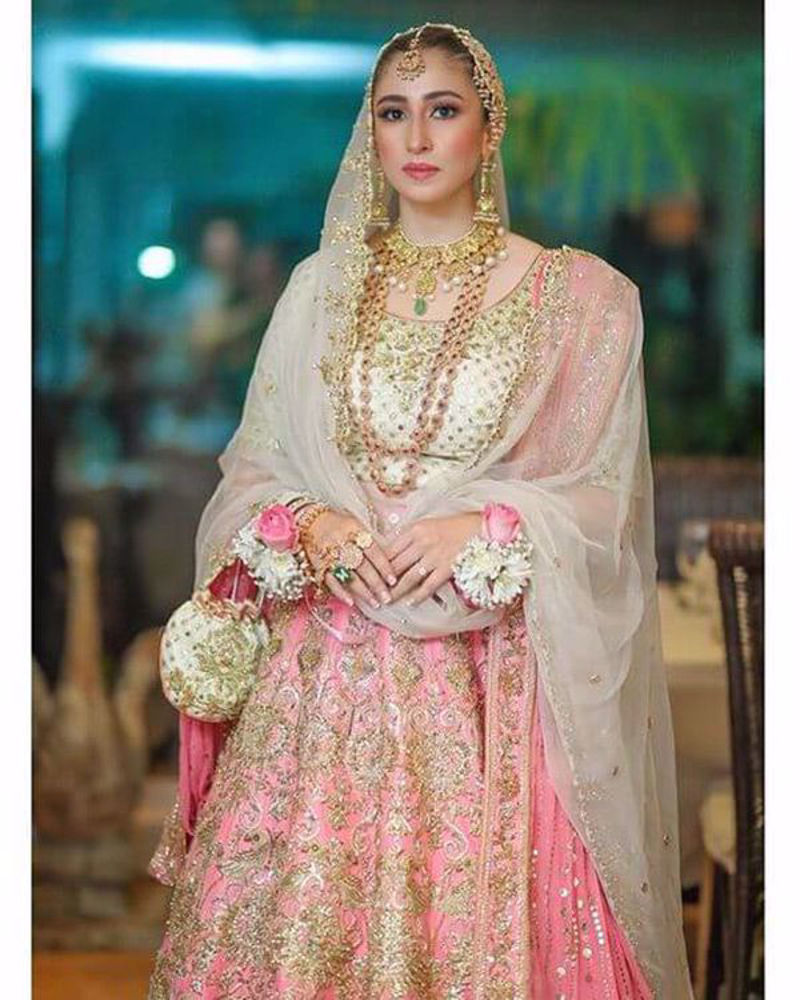 Picture of Our favourite celebrity stylist wears a gorgeous combination of rani pink and ivory, with the most bedazzling gold kaam, paired