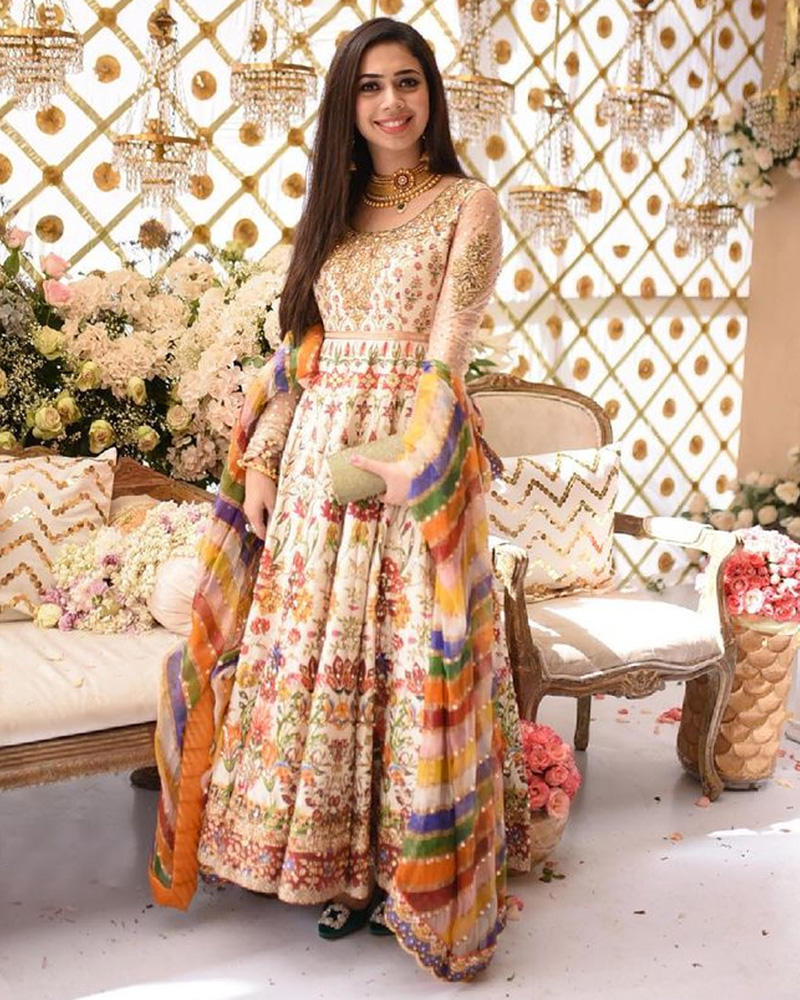 Picture of Paired with a printed and handworked chiffon dupatta in multicolours, Neha’s ivory pishwaas shines bright!