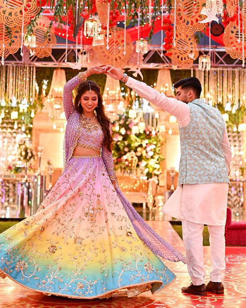 Picture of A pastel rainbow with gold handwork and an intricately bordered dupatta with delicate detailing for Maheen’s summer mehndi look.