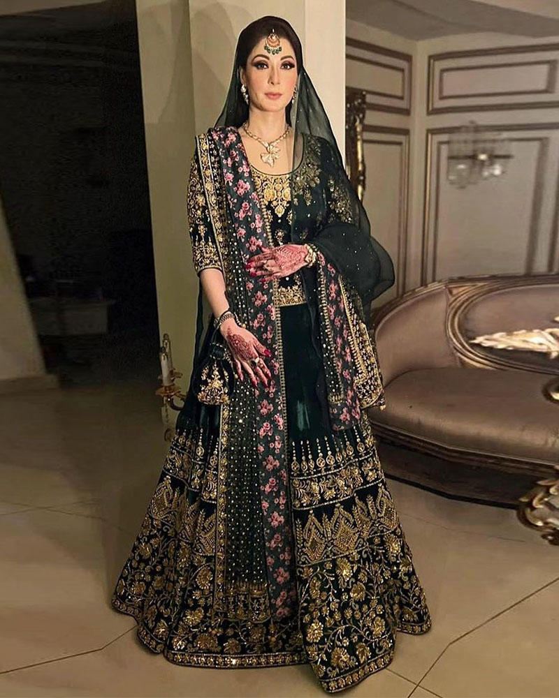 Picture of Handcrafted especially for the special lady, Maryam Nawaz looks regal in a bespoke Nomi Ansari emerald green velvet lehnga and choli.