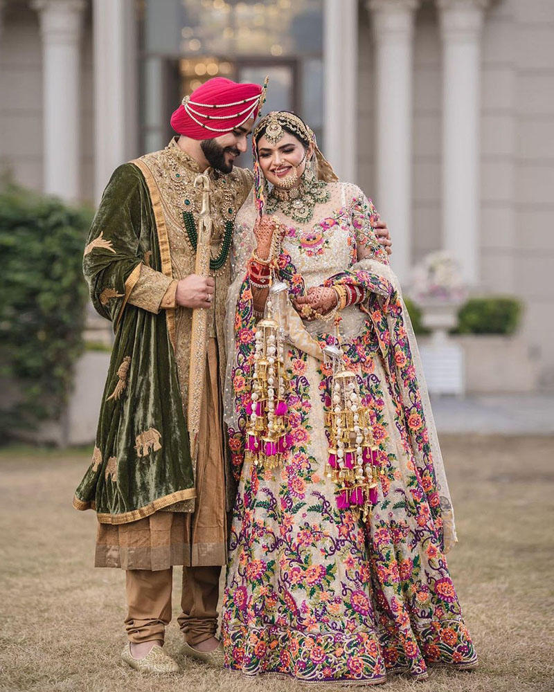 Picture of All the way from Amritsar, Heavendeep Gill looks regal in our ivory lehnga and choli, finished with a grand trail dupatta to complete the look.