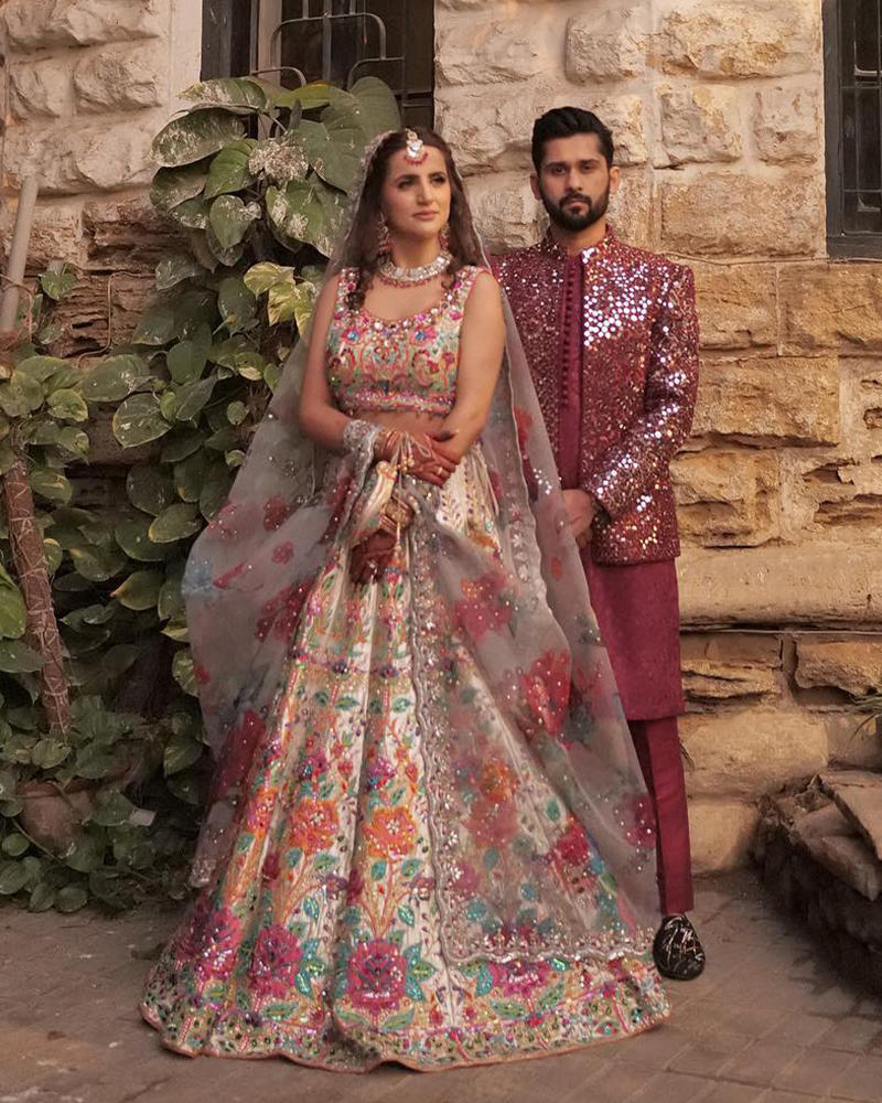 Picture of The bride and groom complement each other perfectly in our bespoke creations.