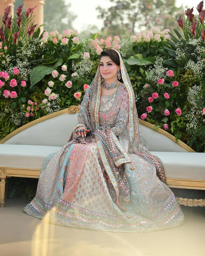 Picture of Silver zardozi glistens over a pastel canvas, mix with pink and mint accents, an exquisitely crafted custom valima ensemble, carried with true grace by CM Maryam Nawaz.